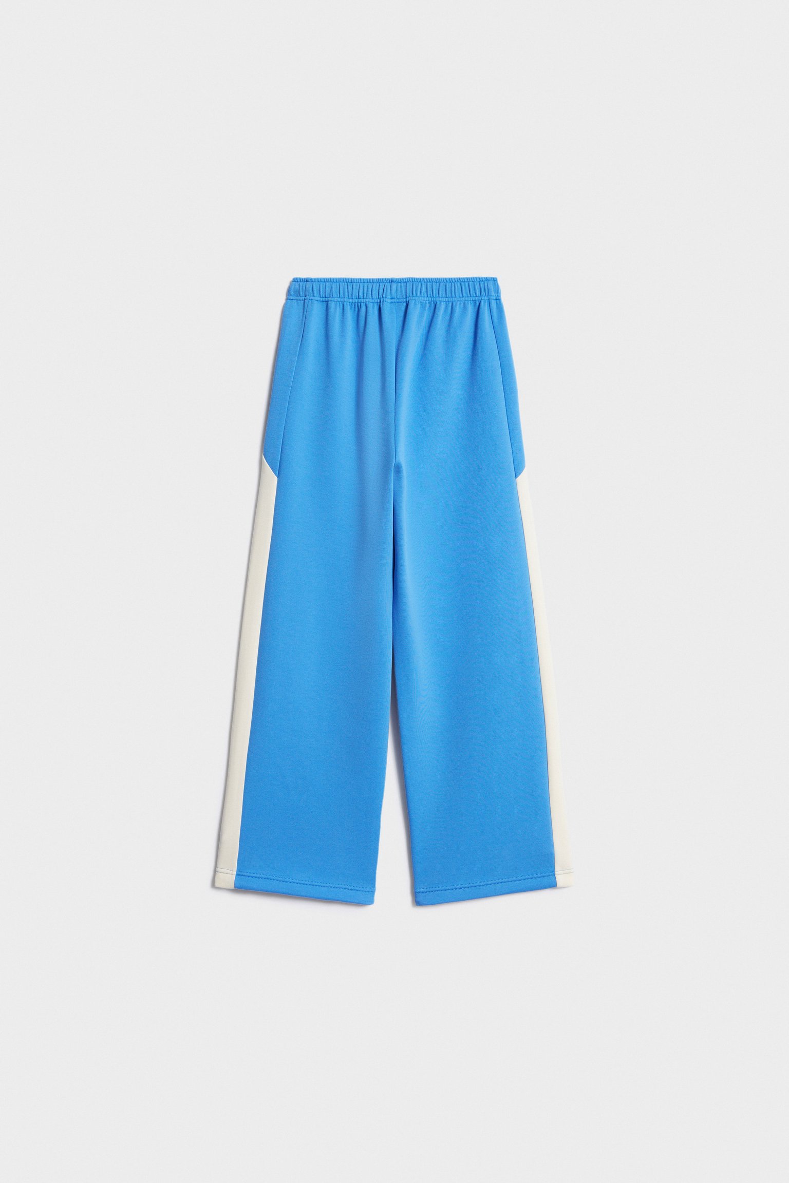 Контрастные брюки из пике́