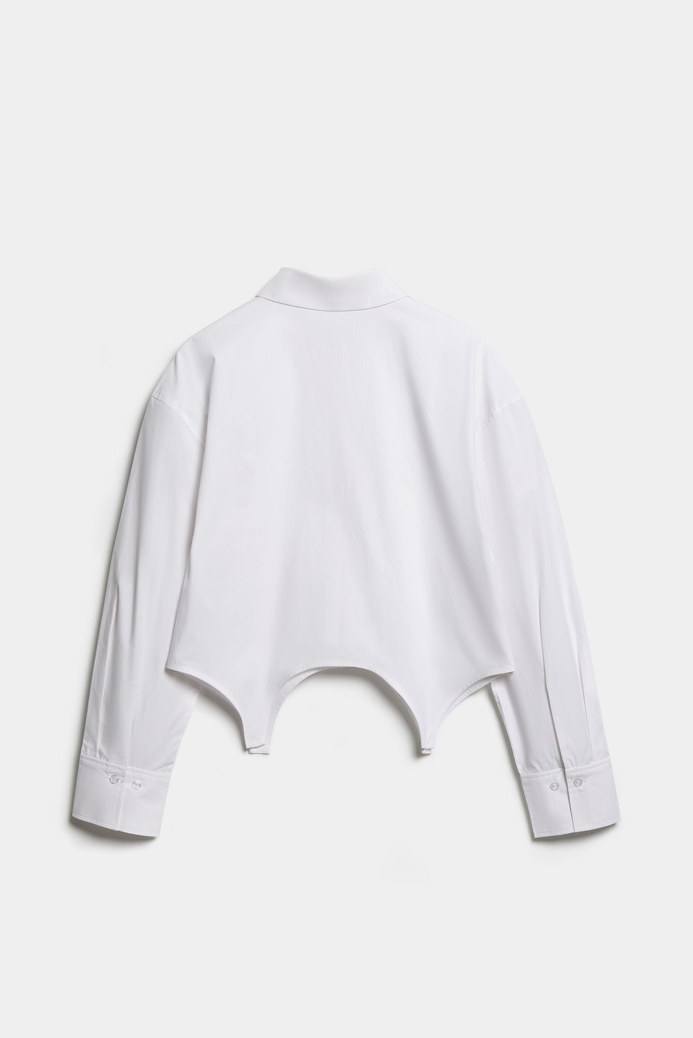 Рубашка oversize в технике деконструкции